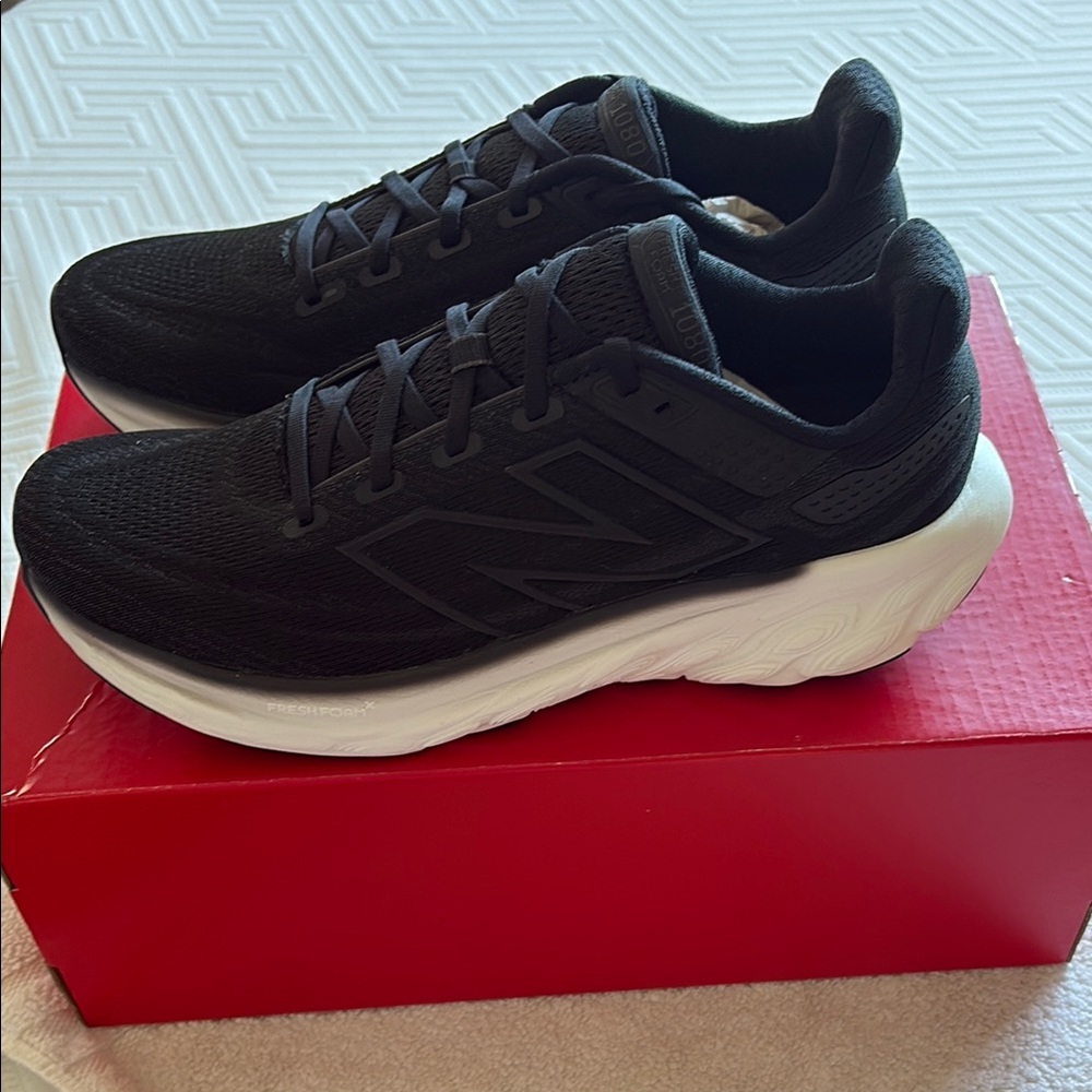 New Balance Black and White Athletic Shoes with Mesh Upper